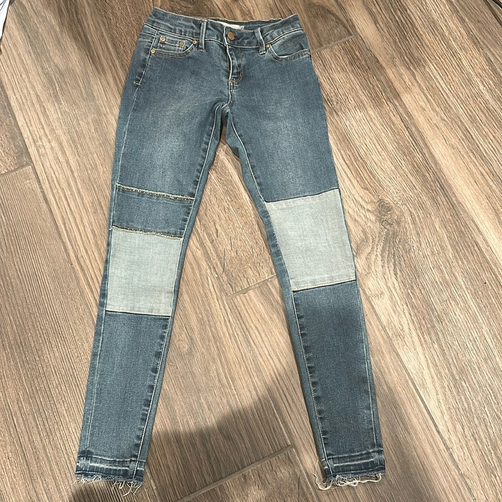 Girls blue jeans, medium wash with patches, girls size 8